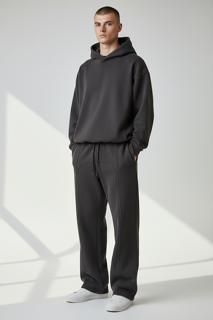 Lumnco dark grey tapered sweatpants with rope drawcord and contrast stitching.